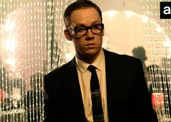 AMC+ Releases Trailer for Enthralling New Spy Thriller, “The Ipcress File” Starring Joe Cole, Lucy Boynton, and Tom Hollander [VIDEO]